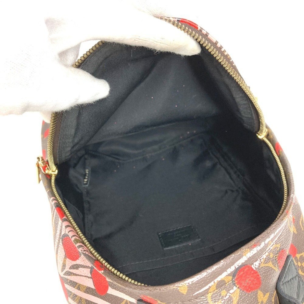 LOUIS VUITTON Brown Monogram Canvas Backpack - Picture 12 of 16
